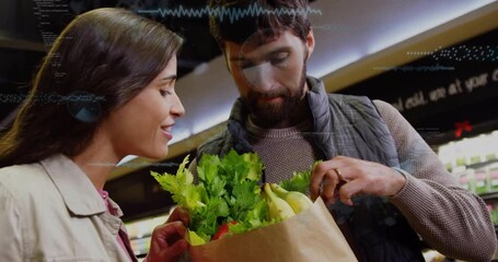 Couple shopping for fresh produce with data processing animation overlay - Powered by Adobe