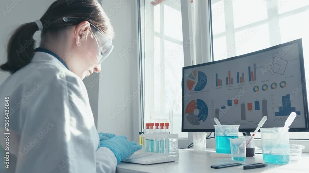 Poster in a lab with vials and charts, a dedicated scientist conducts research exemplifying the quest for g