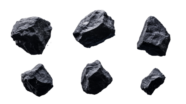 Dark rocks of irregular shape isolated against black background, cut out transparent