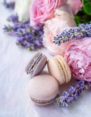 Fototapeta premium Pastel macarons with pink roses and lavender arrangement