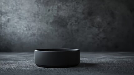 Stunning Minimalist Black Bowl Outlined by Soft Light on Dark Background, Perfect for Modern Decor and Artistic Presentations