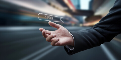 Hand in suit interacting with a digital search bar, showcasing online search concept, technology, and internet access, suggesting ease of use and efficiency
