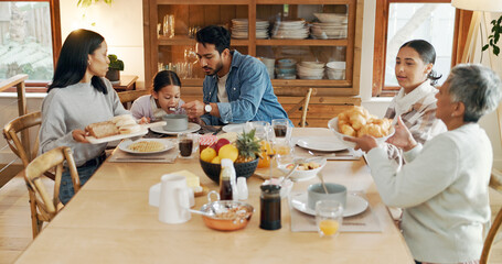 Family, child or parents in home for lunch for healthy meal, bowl or helping with love or care. Group reunion, help or people in dining room for brunch, nutrition or feast with diet, girl or support