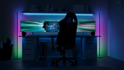 This image showcases a modern gaming room with vibrant LED lighting enhancing the immersive atmosphere. The setup features a multi-monitor display and an ergonomic chair
