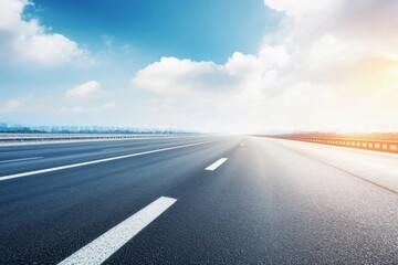 Fototapeta premium A blurred highway road with a city background, captured in daylight