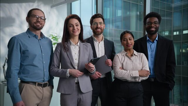 Portrait multiethnic Caucasian African business team men women happy businesspeople looking at camera businessmen businesswomen smiling professional corporate in office company leadership colleagues