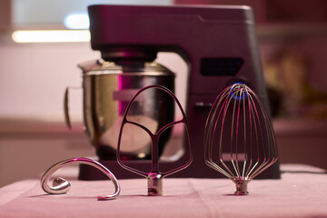 A versatile kitchen mixer with attachments designed specifically for baking needs
