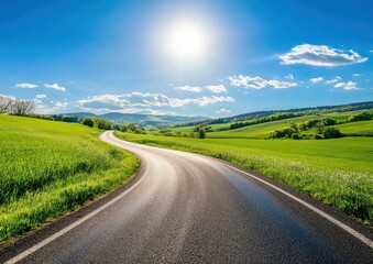 Fototapeta premium Driving on Country Road Through Green Fields Under Bright Sunny Sky