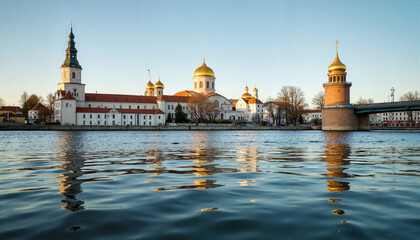 Obraz premium River View of Historical Church with Reflections at Sunset, Golden Domes of Church, Day of Slavonic Script and Culture 