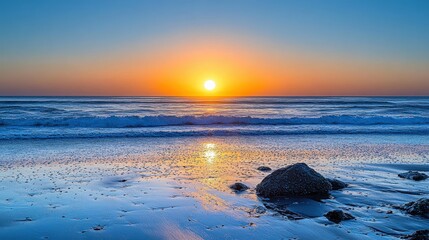 Sunset over the Coastal Waves