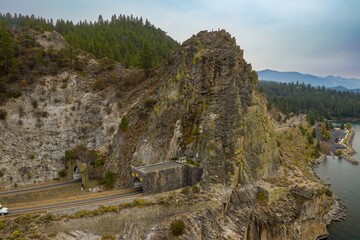 Cars travel through the Cave Rock tunnel on Highway 50, along Lake Tahoe in Nevada, USA. The tunnel...