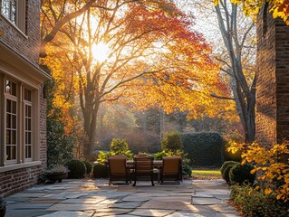 Naklejka premium Autumnal sunset illuminates patio furniture beneath vibrant foliage.