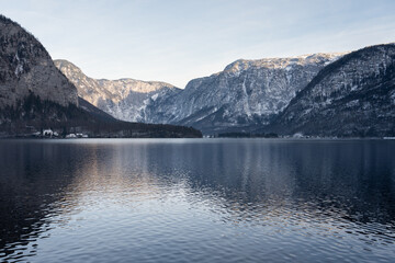 Bright sunny winter day, Alps, Hallstatt lake and village view.
