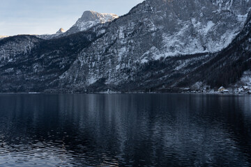 Bright sunny winter day, Alps, Hallstatt lake and village view.