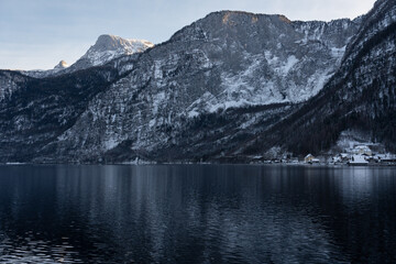 Bright sunny winter day, Alps, Hallstatt lake and village view.
