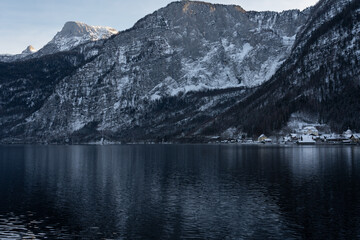 Bright sunny winter day, Alps, Hallstatt lake and village view.