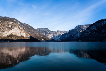 Bright sunny winter day, Alps, Hallstatt lake and village view.