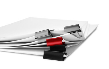 Difference, uniqueness, individuality. Pile of documents with black binder clips and one red on white background