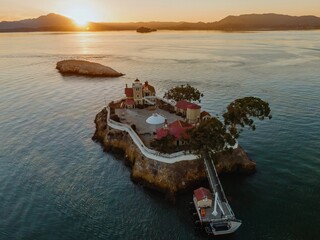 An aerial view of the Brothers Island Lighthouse, a historic landmark in Richmond, California, USA....