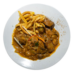 Stewed pork with mushrooms and French fries on a white plate, top view. Delicious stew for lunch. Isolated over white background