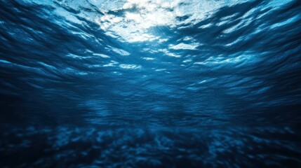 Beautiful underwater view capturing light rays and ocean surface