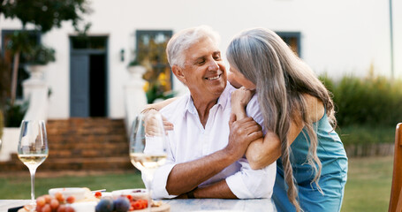 Date, outdoor and old couple with smile, food and bonding together with anniversary celebration. Marriage, senior man or mature woman in backyard, fruit dessert and relationship with romance and love