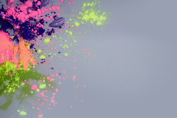 Colorful Powder Explosion. Bright neon powders scattered on a gray surface,