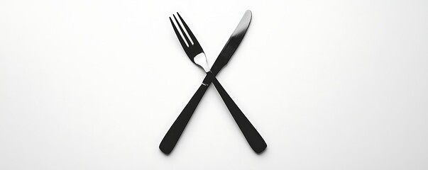 Fototapeta premium A fork and knife symbolizing dining or food, black-filled on white