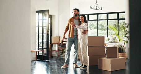 Smile, couple and talk with hug at new house for planning, decor ideas and interior design of...