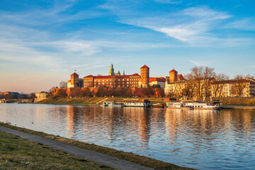 Fototapeta premium Wawel castle famous landmark in Krakow Poland. Picturesque landscape on coast river Wisla