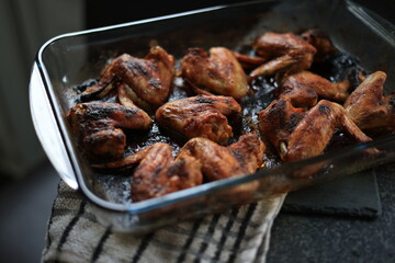 Grilled chicken wings in tray