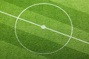 Football field with markings on green turf
