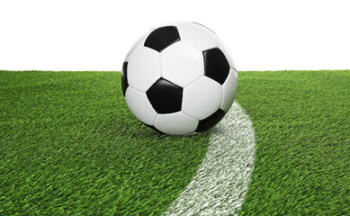 Football field with markings and soccer ball on green turf