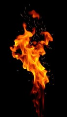 Fototapeta premium Intense orange and yellow flames with bright sparks against a pure black background, fiery, background