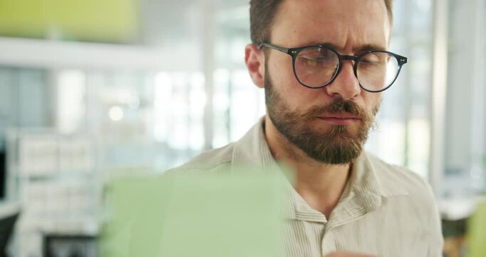 Office, businessman and thinking with sticky note for writing, brainstorming and project solution. Glass wall, male person and manager with mind map for ideas, problem solving and creative strategy