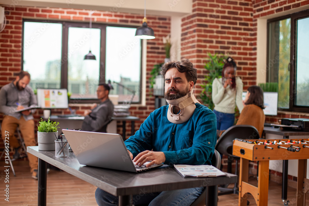 Poster professional male analyst reviewing research data on device and managing work tasks while recovering