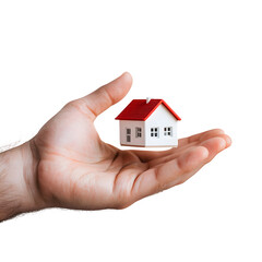 Miniature House with Red Roof in Open Hand on Black Surface for Real Estate Concepts and Home Ownership Imagery