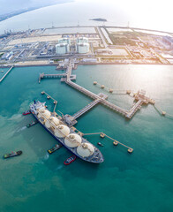LNG (Liquified Natural Gas) tanker anchored in Gas terminal gas tanks for storage. Oil Crude Gas...