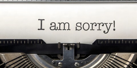 I Am Sorry written on paper in a typewriter, expressing an apology and regret with a vintage and nostalgic appeal, perfect for messages of forgiveness banner and cover