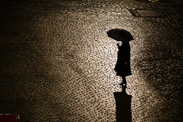 silhouette of a woman in the street