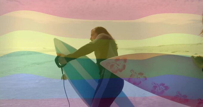 Carrying surfboard on beach, surfer with animation of rainbow wave pattern