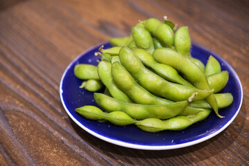 boiled Edamame food on table. side dish in Japanese cuisine