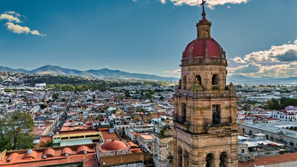 Panoramic aerial view of the city of Morelia (Mexico) with the tower of the church of San Agustin...