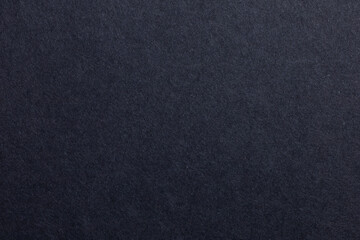 A black background with a lot of texture, textured origami paper backdrop