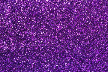 A purple background with glittery purple dots