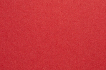 A red background with a white line, textured origami paper backdrop