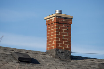 red brick chimney on the roof