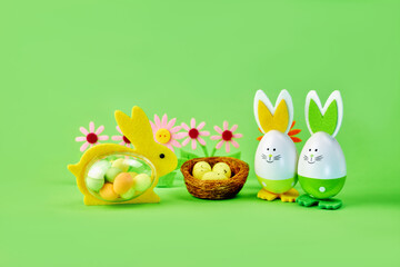 female rabbit with eggs inside came to visit family of cute Easter bunnies with nest with yellow...