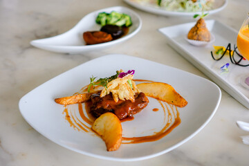 Gourmet Beef Dish with Crispy Garnish
