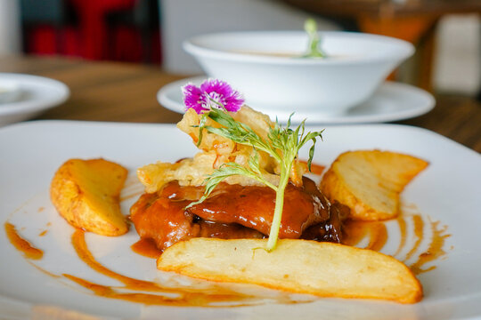 Gourmet Beef Dish with Crispy Garnish